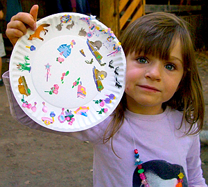 image: little_girl_holding_up_paper_plate_artwork%5B300x271%5D